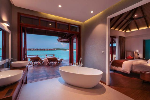 Water-Villa-with-Pool-Villa-Cross-Section-at-Dusk-VARU-by-Atmos